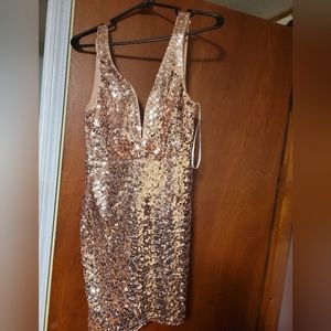 Size small. NWT. Lulus. Rose gold sequin cocktail dress.